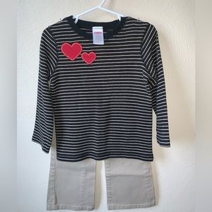 New no tags
Nannette sweater
All over heart pattern with gold sequin cent heart.